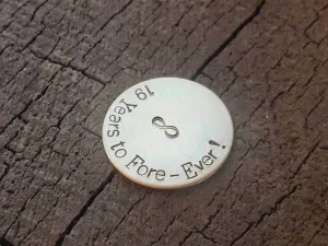 Bronze golf ball marker for 19th and 8th bronze anniversaries