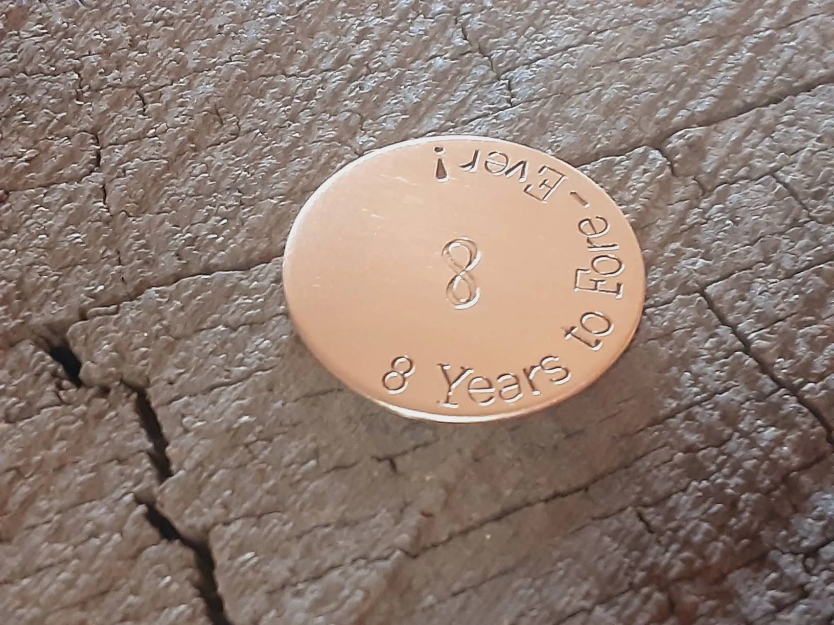 Bronze golf ball marker for 8th or 19th anniversary