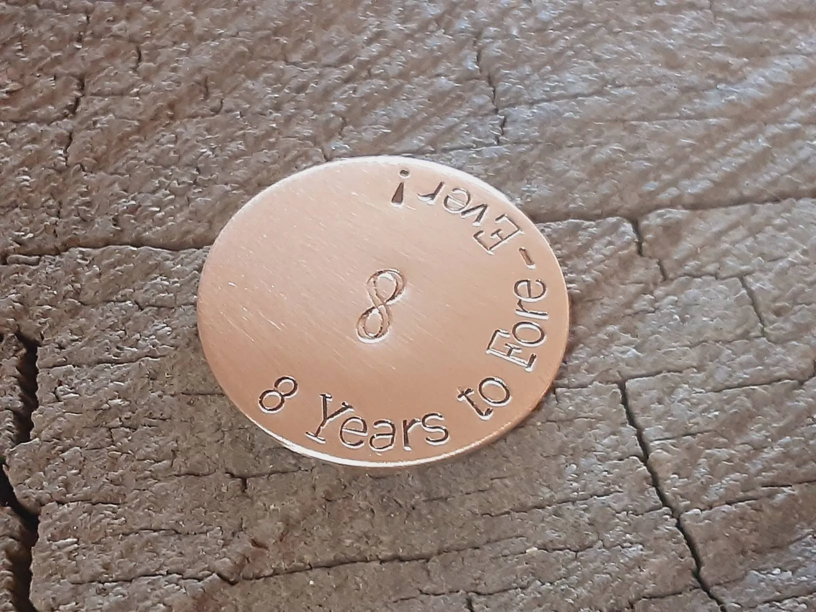 Bronze golf ball marker for 8th or 19th anniversary