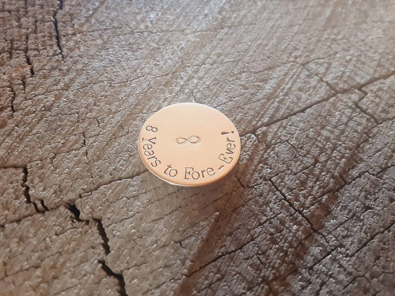 Bronze golf ball marker for 8th or 19th anniversary