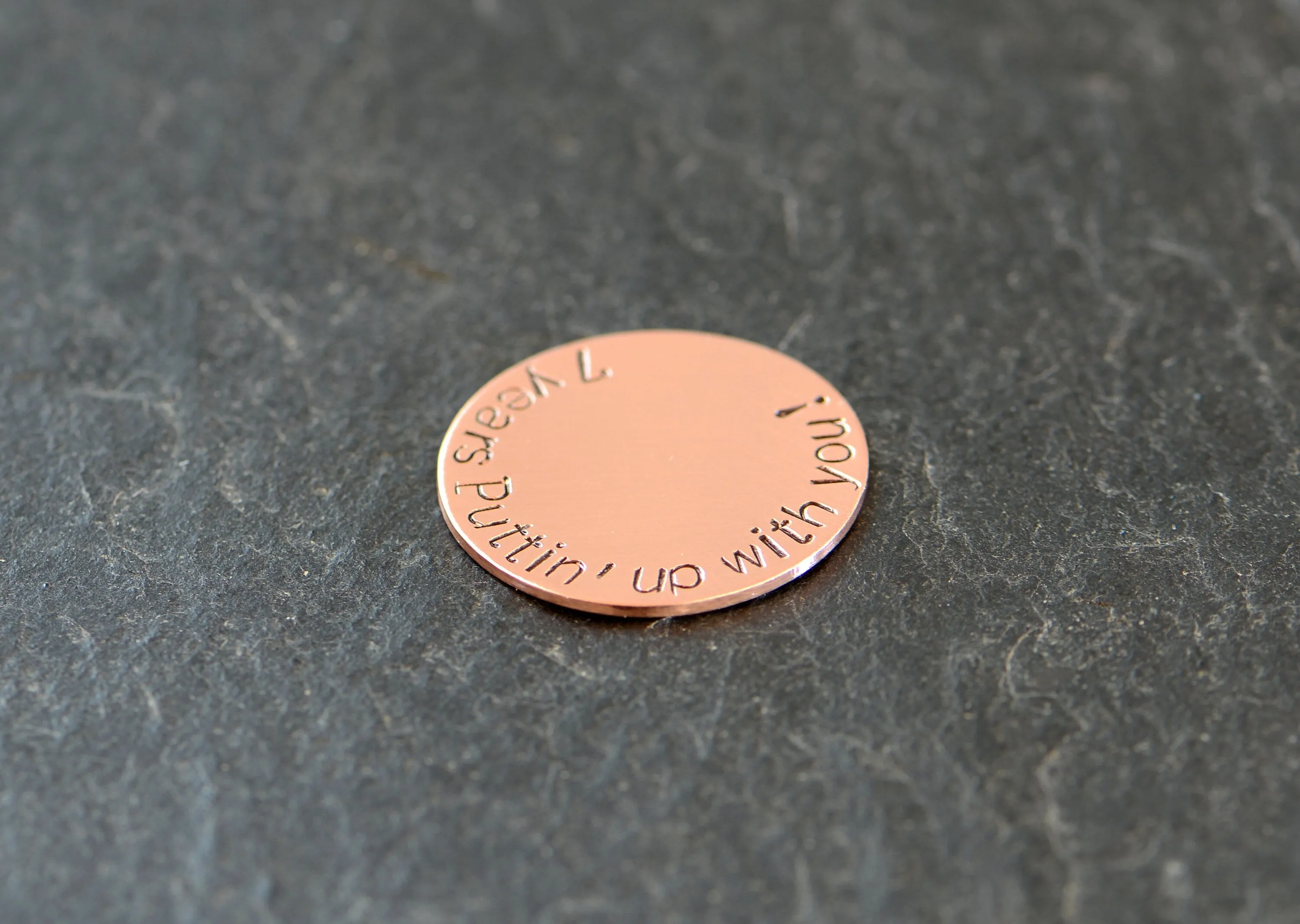 Copper golf ball marker for the 7th anniversary