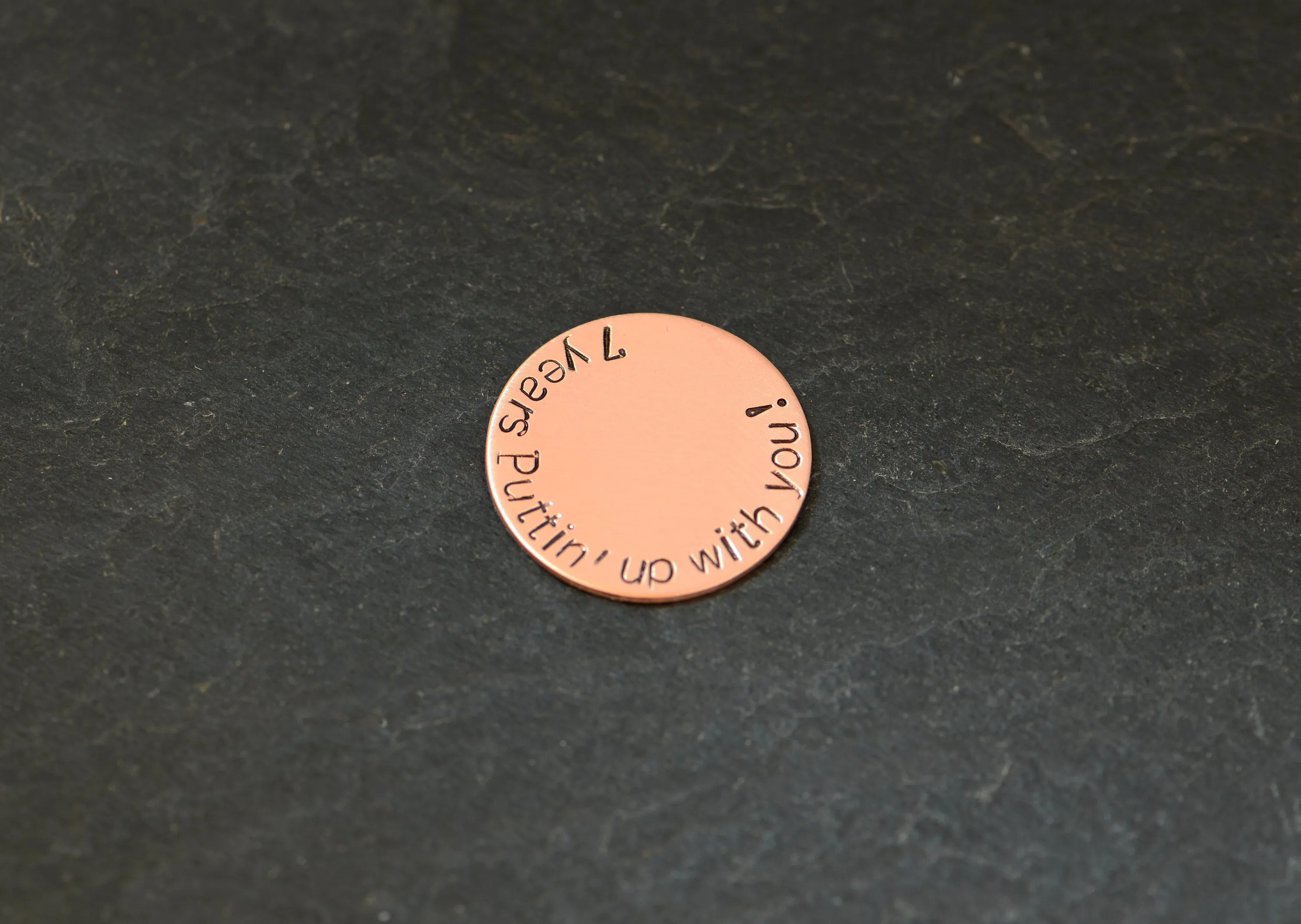 Copper golf ball marker for the 7th anniversary