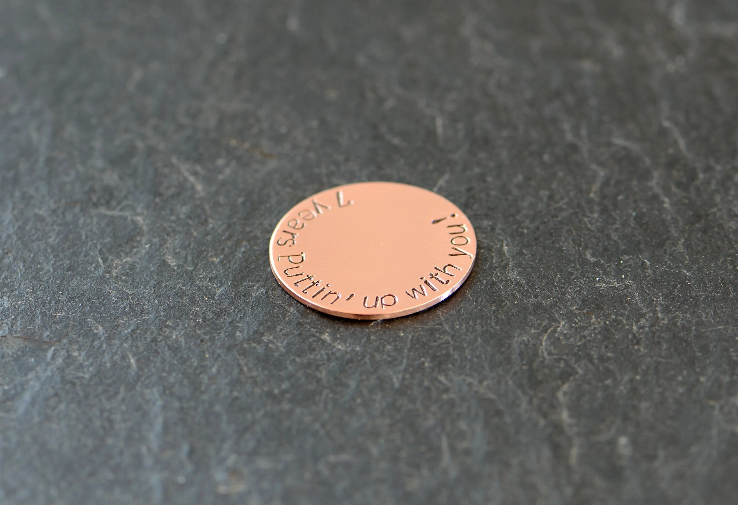 Copper golf ball marker for the 7th anniversary