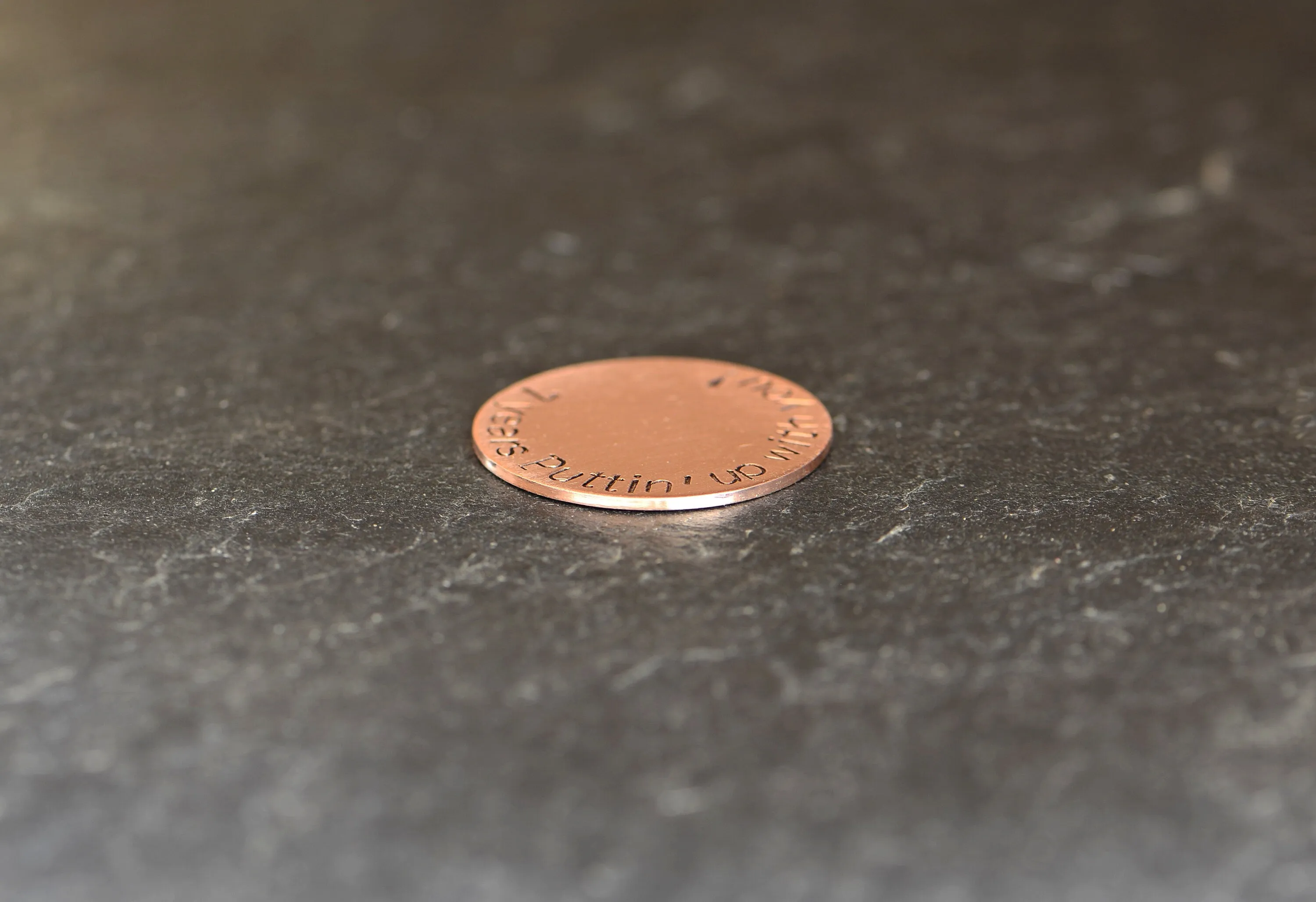Copper golf ball marker for the 7th anniversary