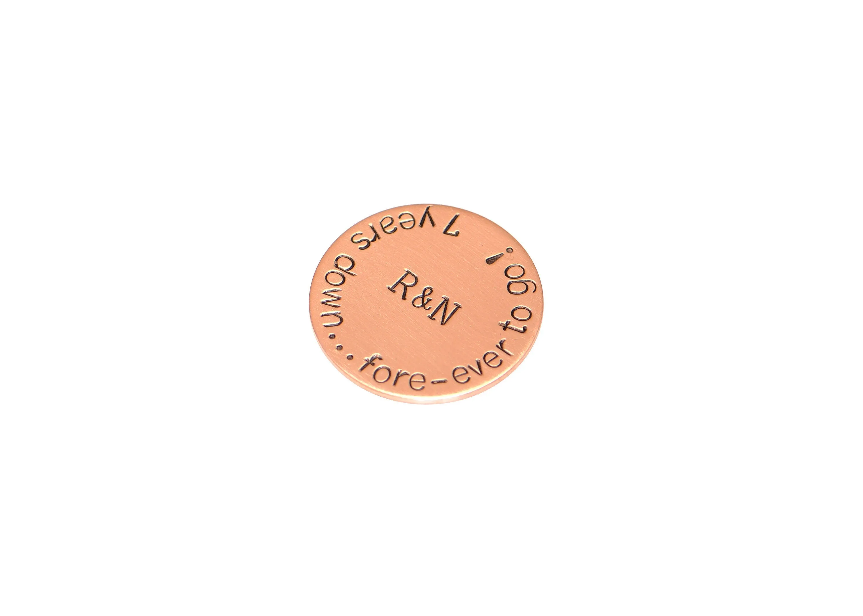 Golf ball marker in bronze