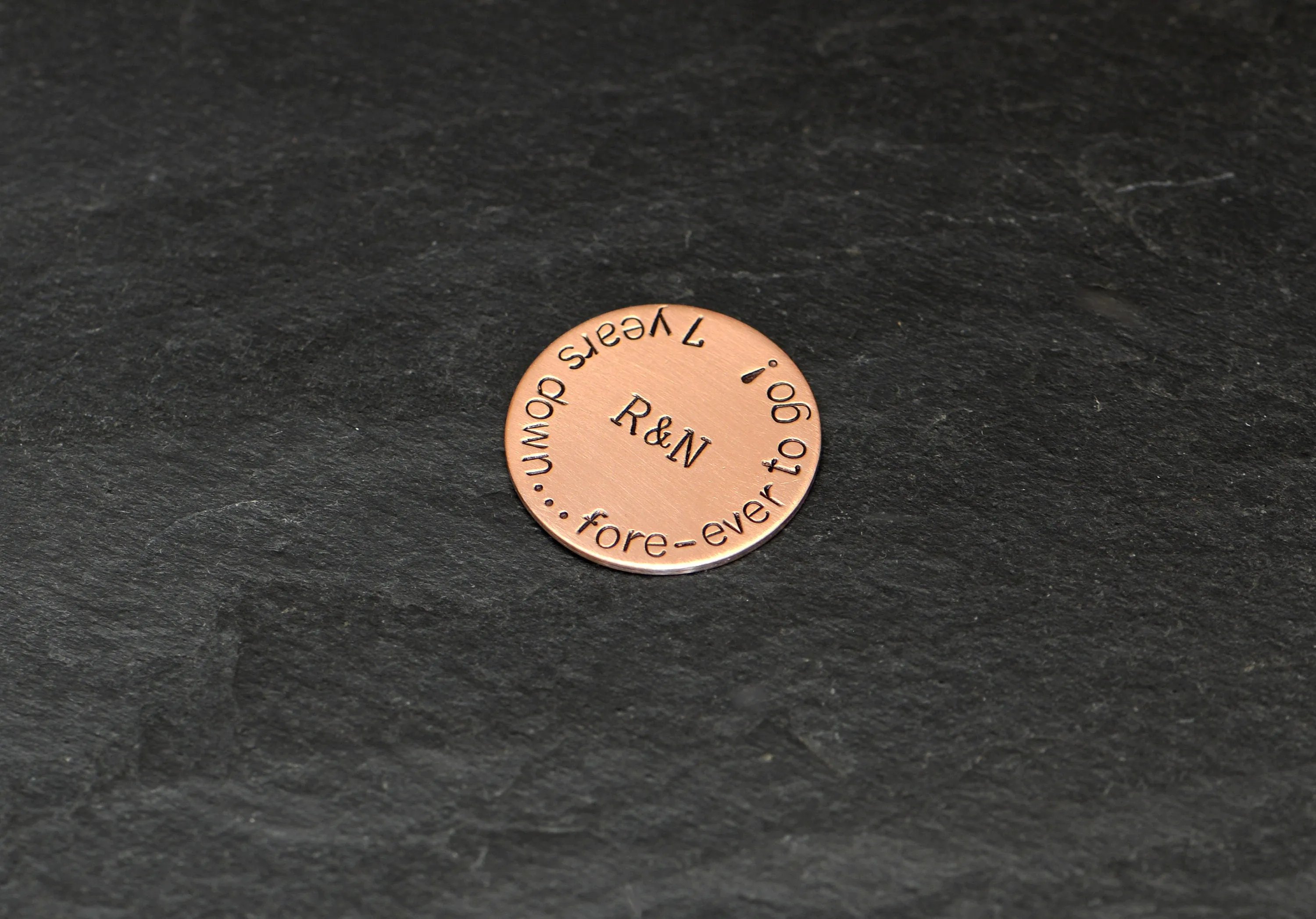 Golf ball marker in bronze