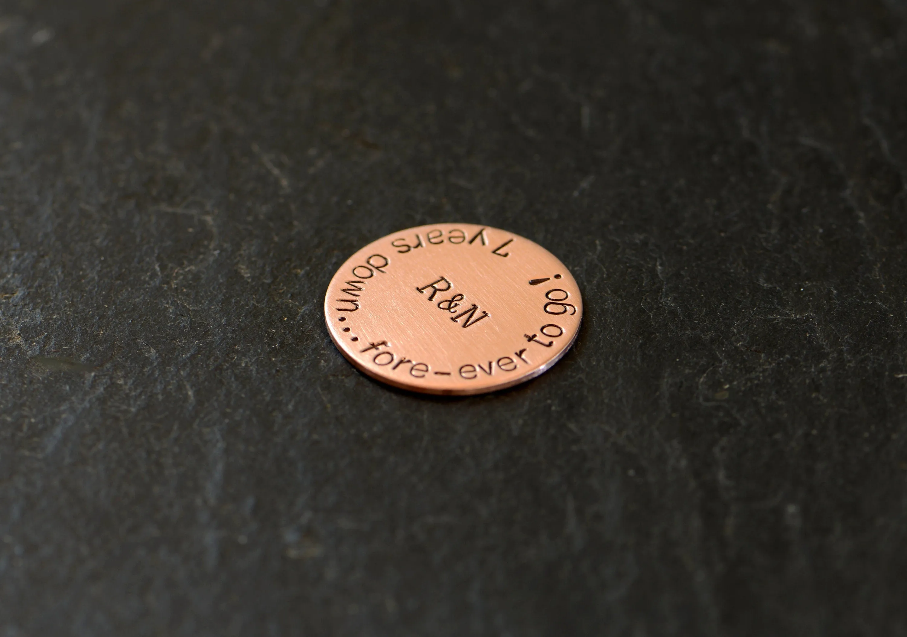 Golf ball marker in bronze