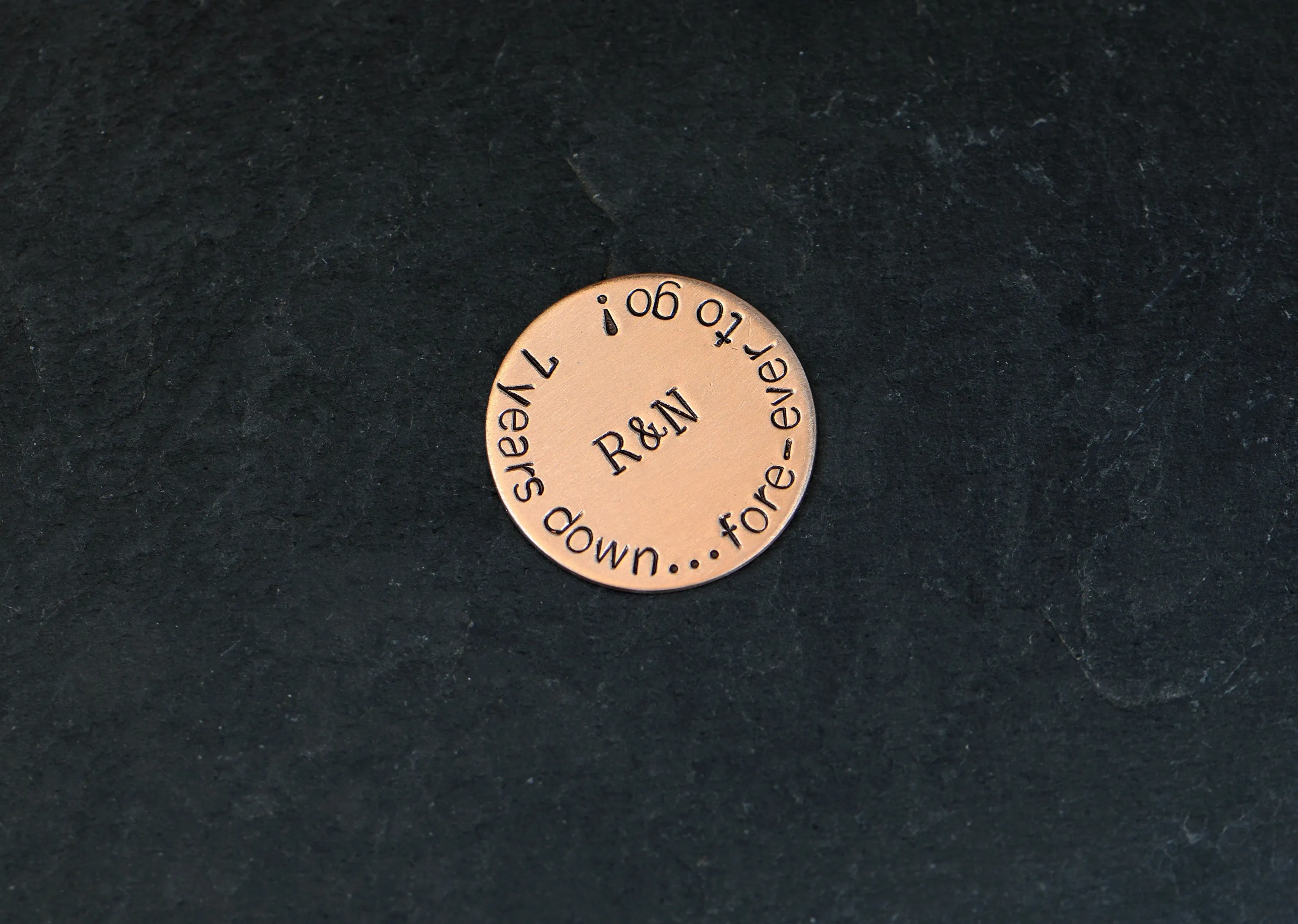 Golf ball marker in bronze